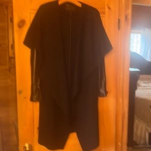 Bcbg black coat with lamb leather on arms wore one time mid length